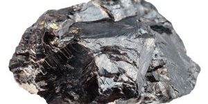 macro shooting of natural mineral stone - stone of sphalerite (zinc blende) isolated on white background